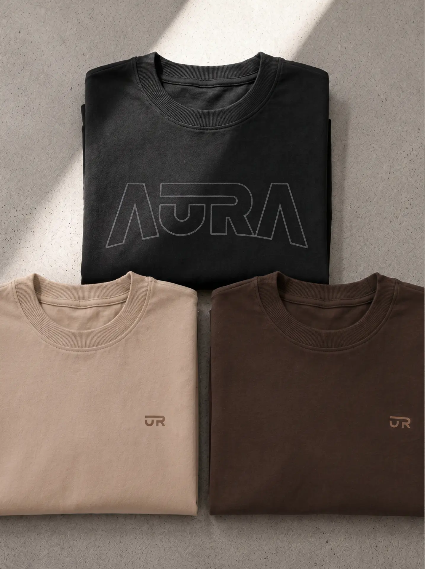 Aura collection tees, folded flatlay